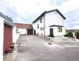 Bild 1 - Charmantes Einfamilienhaus mit großem Grundstück und Ausbaupotenzial in Wolnzach!