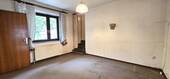 EG: Durchgangszimmer mit Blick zum Elternschlafzimmer/begehbarem Kleiderschrank - 