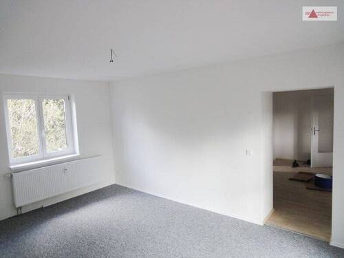 Wohnzimmer gr. Whg. 1. OG - 