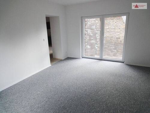 Wohnzimmer mit Balkon 1.OG - 