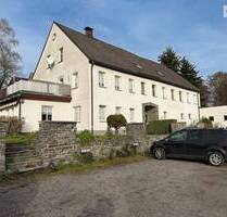 Vollvermietetes Mehrfamilienhaus mit Balkonen, Garagen & weiterem Entwicklungspotential-Crottendorf