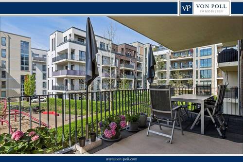 Von Poll Immobilien - Moderne und lichtdurchflutete 4-Zimmer-Wohnung mit großem Balkon