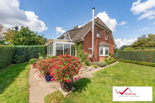 Westseite mit Wintergarten - 
