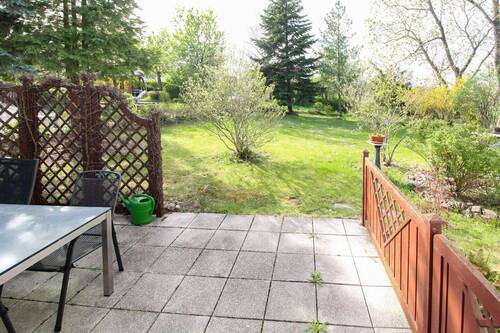 Terrasse mit Blick in den Garten - Mehrfamilienhaus, Wohnhaus in Freital zum Kaufen