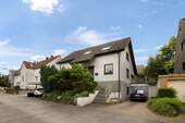 Außenansicht - Exklusive Wohnqualität: Sonnige 2-Zimmer-Wohnung mit Terrasse im ruhigen Zweifamilienhaus