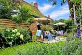 Sonnige Terrasse im Garten - Einfamilienhaus mit 110,00 m&sup2; in Oevenum zum Kaufen