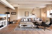 Gemütliches Wohnzimmer mit Kaminofen - 3 Zimmer Terrassenwohnung zum Kaufen in Oevenum
