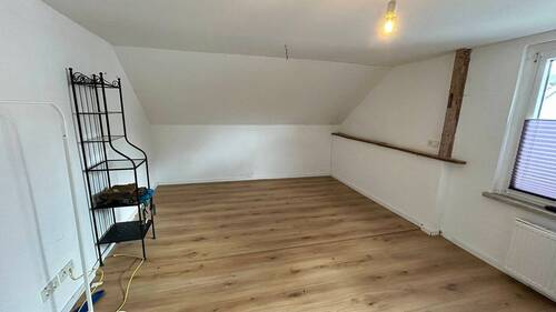 Zimmer im Dachgeschoss - 