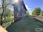 Seitenansicht - 3 Zimmer Mehrfamilienhaus, Wohnhaus zum Kaufen in Husum