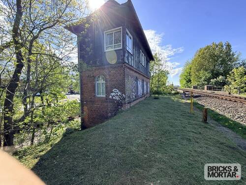 Seitenansicht - 3 Zimmer Mehrfamilienhaus, Wohnhaus zum Kaufen in Husum