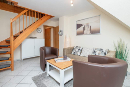 Treppe zum oberen Bereich - Etagenwohnung mit 60,00 m² in Timmendorfer Strand zum Kaufen
