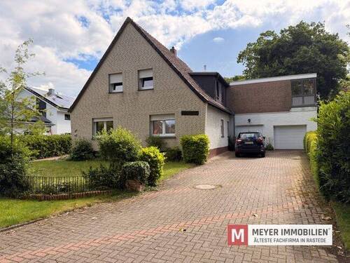 Objektansicht - 6 Zimmer Mehrfamilienhaus, Wohnhaus zum Kaufen in Wiefelstede