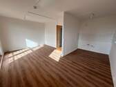 Beispielbild Wohnzimmer mit offener Küche - 2 Zimmer Etagenwohnung zur Miete in Magdeburg