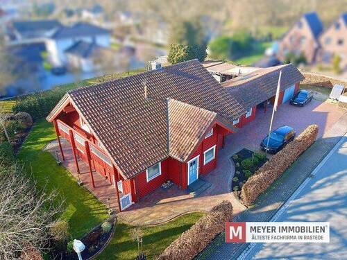 Objektansicht - Großzügiges Niedrigenergie-Holzhaus mit separater Büroeinheit im Gewerbegebiet von Wiefelstede (Obj.-Nr.: 5672)