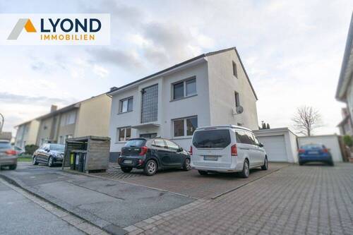 Außenansicht / Stellplätze - Mehrfamilienhaus, Wohnhaus zum Kaufen in Dortmund / Brechten