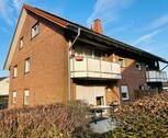 Bild_mit_Balkon_seitl. - Wunderschöne Eigentumswohnung im ersten Obergeschoss mit großem Balkon zu verkaufen.