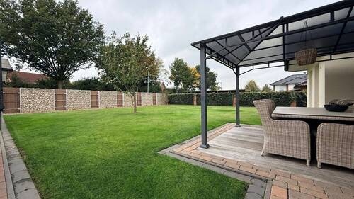 Moderner Garten mit Terrasse - 1 Zimmer Einfamilienhaus in Bersenbrück