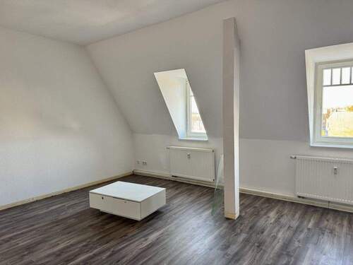 Dachgeschosswohnung Wohnzimmer - 