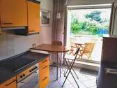 Küche mit Zugang zum Balkon - 