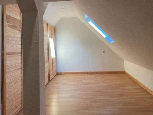 ausgebauter Spitzboden_Nutzfläche mit Schrankverkleidung - 