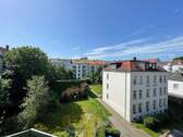Blick von Balkon - Charmante 2-Raumwohnung in denkmalgeschütztem Mehrfamilienhaus in Stötteritz