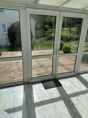 Wintergarten mit Terrassenzugang - 