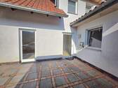 Terrasse zur Küche am Carport - 