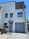 Haus Außenansicht.jpeg - Neuwertige ETW mit Dachterrasse, Terrasse und Wintergarten