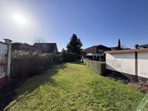 Blick in den Garten - Mehrfamilienhaus, Wohnhaus mit 139,00 m&sup2; in Tönisvorst zum Kaufen