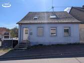 SP-26-CSBD-84 - Gemütliches Einfamilienhaus mit Garten, Balkon & viel Potenzial in Schiffweiler