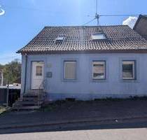 Gemütliches Einfamilienhaus mit Garten, Balkon & viel Potenzial in Schiffweiler