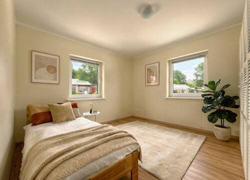 Schlafzimmer - Bungalow mit 90,40 m&sup2; in Hitzacker (Elbe) zum Kaufen