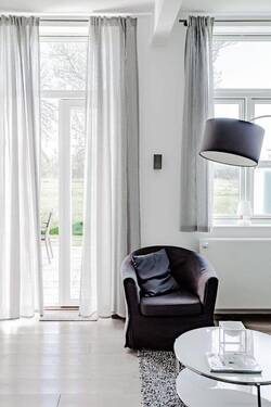 Wohnraum & Zugang zur Terrasse - 3 Zimmer Etagenwohnung zum Kaufen in Vollerwiek