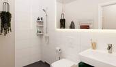 Ein modern gefliestes Badezimmer - 