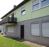 Familienfreundliches Einfamilienhaus mit Garten – inklusive Garage und Carport in Bad Brückenau zu verkaufen