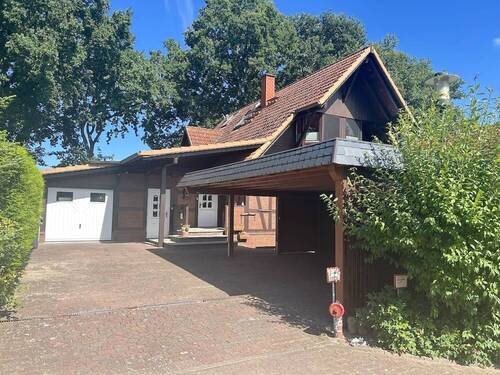 Garage und Carport - 8 Zimmer Einfamilienhaus zum Kaufen in Kiebitzreihe