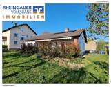 Ansicht Exposé - * Oestrich-Winkel: Massiver Bungalow (saniert ab 2012) auf 723 m² großem Grundstück *