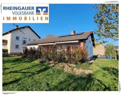 Ansicht Exposé - * Oestrich-Winkel: Massiver Bungalow (saniert ab 2012) auf 723 m² großem Grundstück *