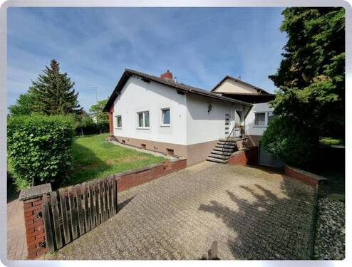 Einfahrt mit Hauseingang - Einfamilienhaus mit 145,00 m² in Oestrich-Winkel zum Kaufen