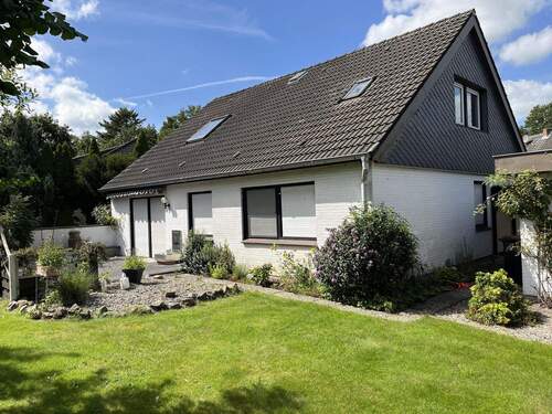 Bild 3 - 7 Zimmer Mehrfamilienhaus, Wohnhaus in Tetenhusen