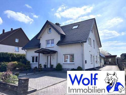 Strassenansicht - Saniertes Zweifamilienhaus mit großem Grundstück in Bünde Hüffen