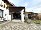 Garage mit angebautem Freisitz - 