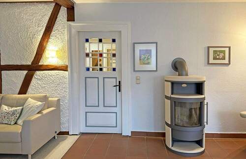 Wohnzimmer mit Kamin - Einfamilienhaus mit 171,00 m&sup2; in Wangelau zum Kaufen