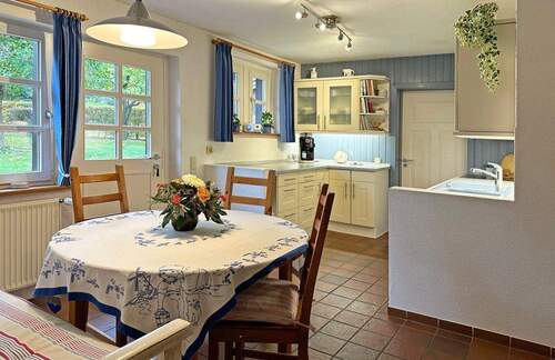 Küche mit Zugang zur Terrasse - 