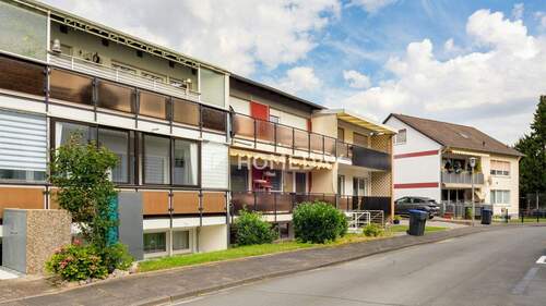 Außenansicht 3 - Sicher vermietetes Mehrfamilienhaus mit 3 WEs, Garten, und Balkone in idealer Lage