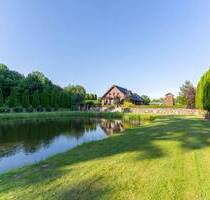 Einzigartige Oase: Stilvolles Einfamilienhaus mit privatem Teich auf ca. 3.400 m² Grundstück - Przemocze Einzigartige Oase: Stilvolles Einfamilienhaus mit privatem Teich auf ca. 3.400 m² Grundstück - Przemocze
