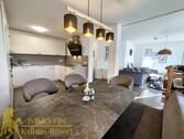 Essbereich mit Blick in die Küche und ins Wozi. - Terrassenwohnung mit 87,30 m&sup2; in Blaustein zum Kaufen