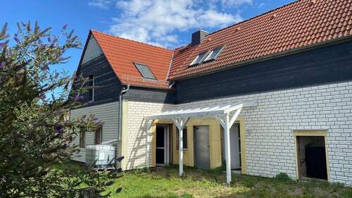 Zugang Wohnung und Werkstatt - 1 Zimmer Einfamilienhaus in Naundorf