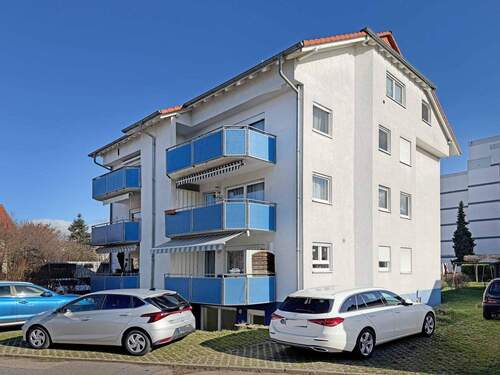 Außenansicht - Helle 2-Zimmer-Wohnung mit Terrasse und zwei Stellplätzen in einem gepflegten Mehrfamilienhaus