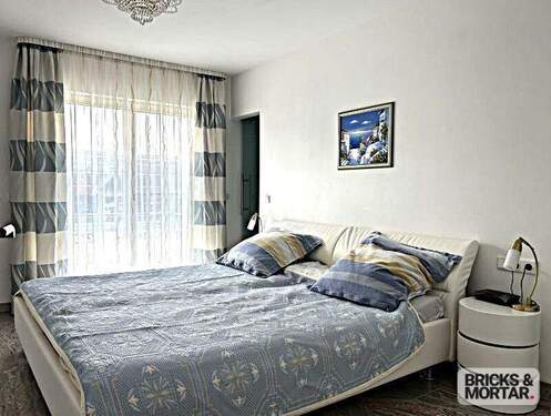 Schlafzimmer mit begehbarem Kleiderschrank - 